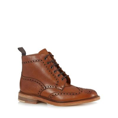 Brown leather brogue boots